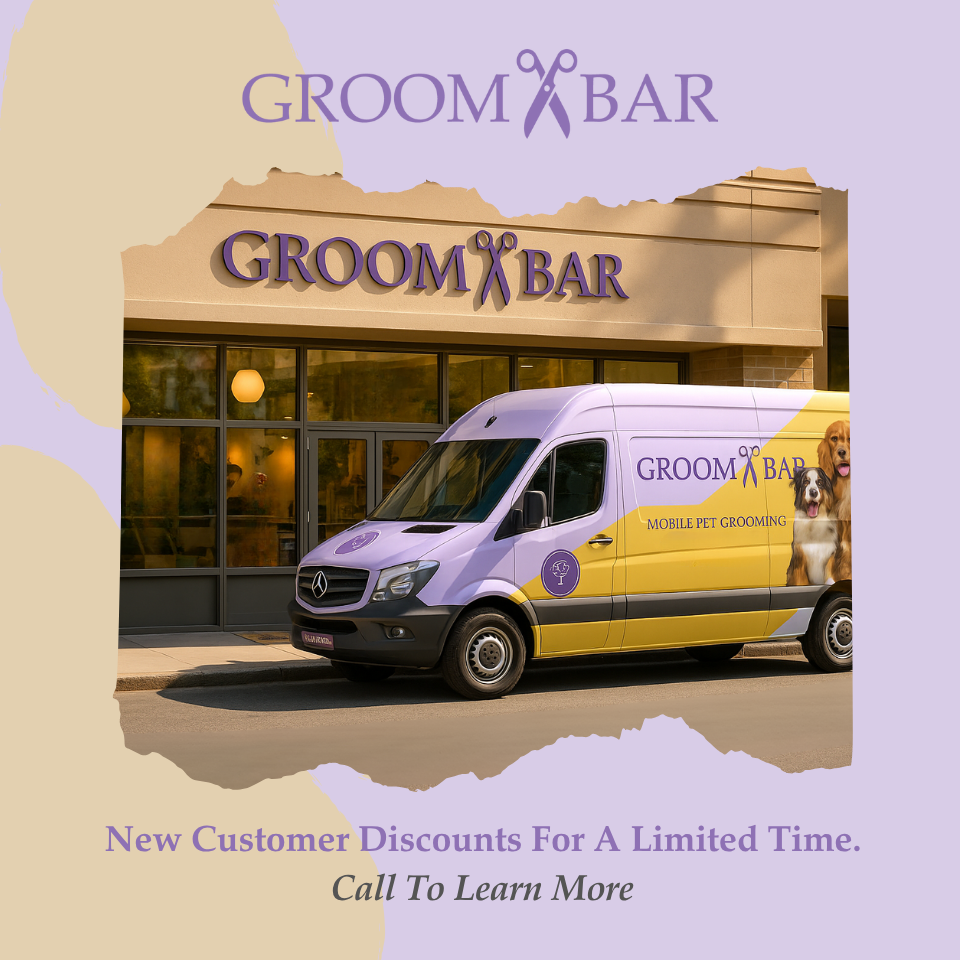 A picture of a grooming van out the front of a groom bar salon. The grooming van has the groom bar logo on it and the words mobile pet grooming.